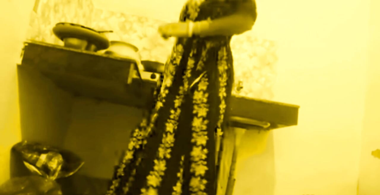 Busty MILF Desi Bhabi Has No Idea Her young Devar see Secretly in the kitchen room.