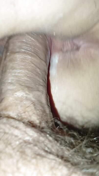 Tracing mature mother's tail from behind