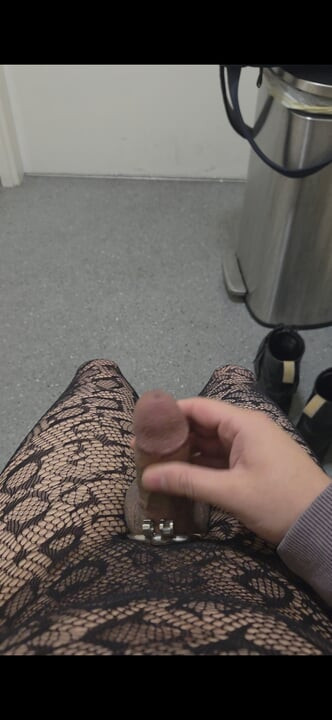 Sissy caged femboy cums in public bathroom