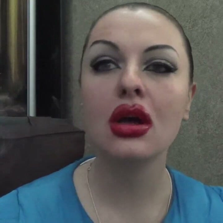 Sexy make-up huge red lips smoking