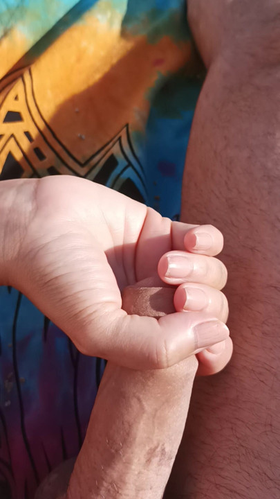Touch my cock on the beach