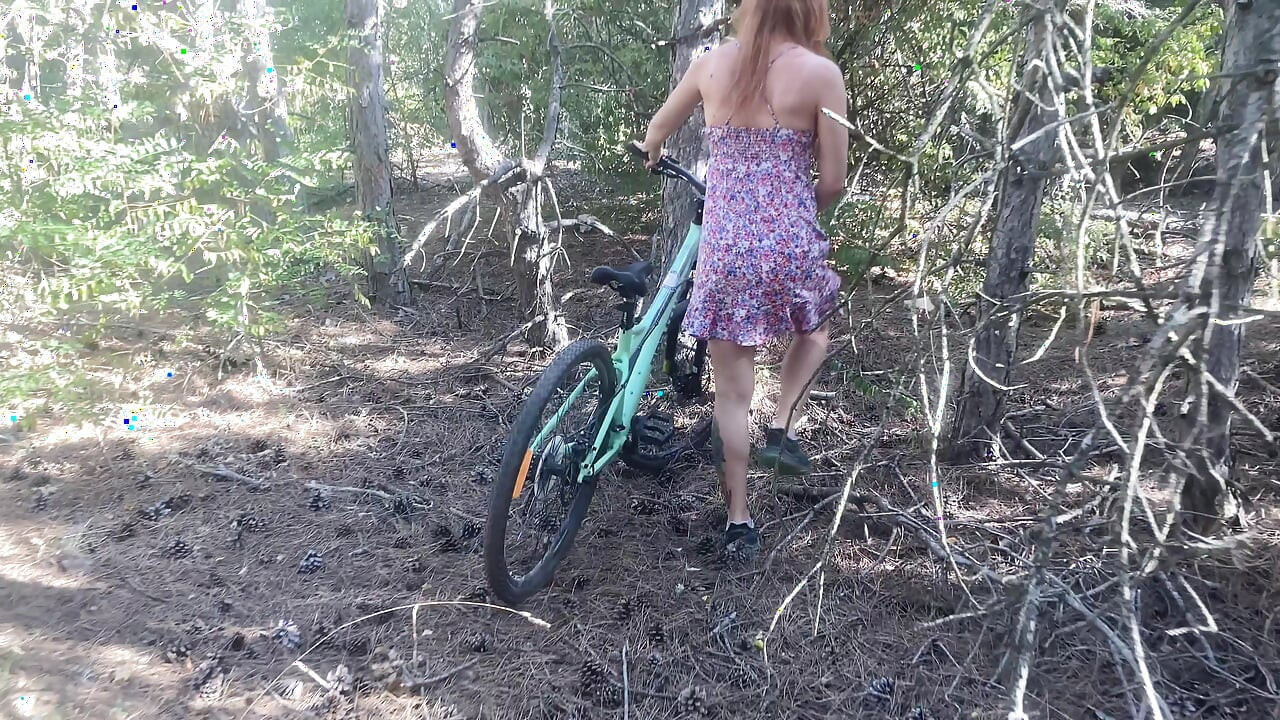 Found cute tattoed girl riding bicycle in the forest and fucking her hairy pussy
