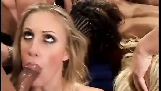 Hot babes sucking off a group of hard dicks