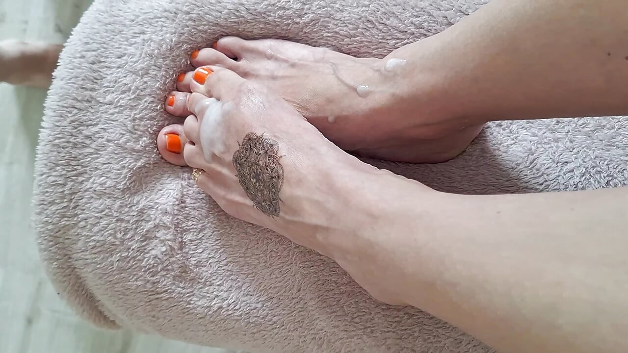 quick squirting on tattooed foot after work