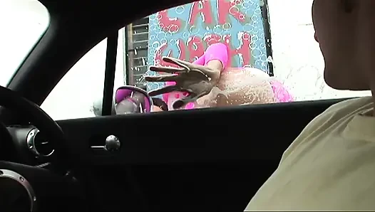 Sex in the car wash with a brunette bitch in sexy pink fishnets