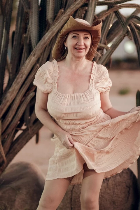 Busty granny as cowgirl