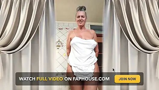 Hot Housewife Lukeria Flirts in the Kitchen in a White Thong and a Small Apron
