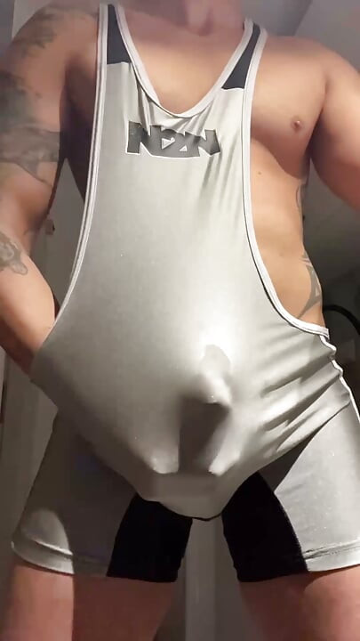 Muscle jock in lycra with huge cock thrusting until he cums