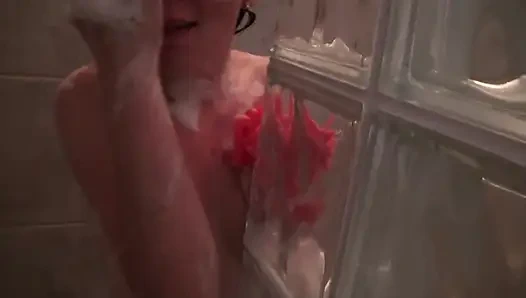 Bathroom action gets moved to the couch with redhead