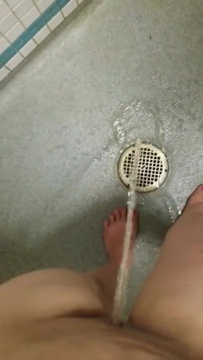 Quick piss on the sewer cap