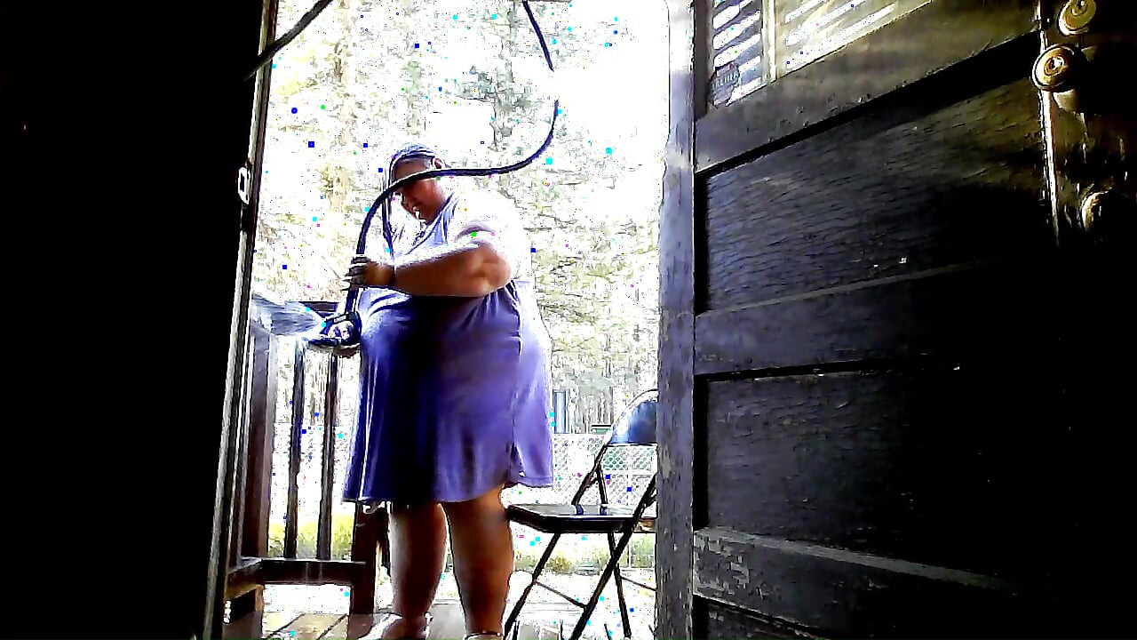 Showering in the water hose. pt 2
