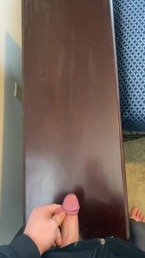 Blowing a load of cum on the table