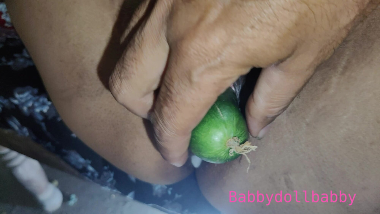 Cucumber insert in pussy