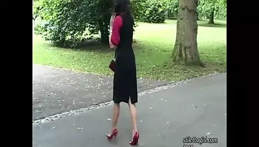 Stiletto Girl Maria teases in shiny nylons red high heels