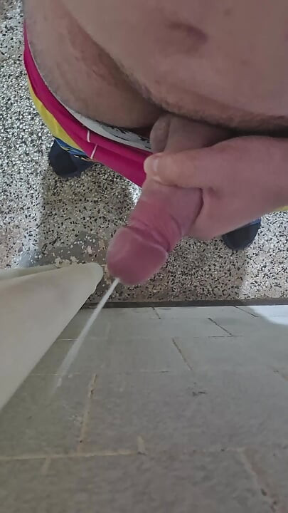 Fat, juicy Bulgarian cock, with a head swollen to the point of bursting, smears semen all over the wall of an old bathroom.