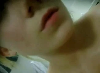 Masturbating
