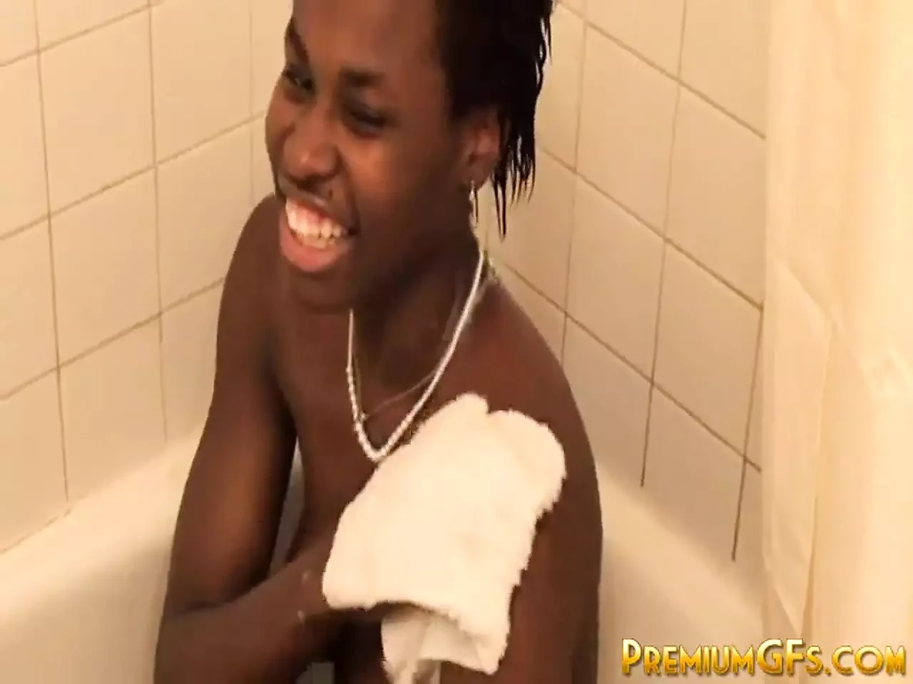 Sexy solo ebony teen pats her pussy