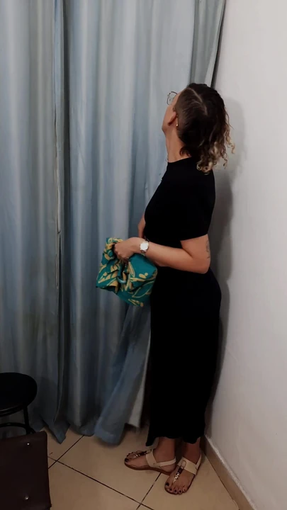 Powerful moment from "A store dressing room is used by a perverted couple."