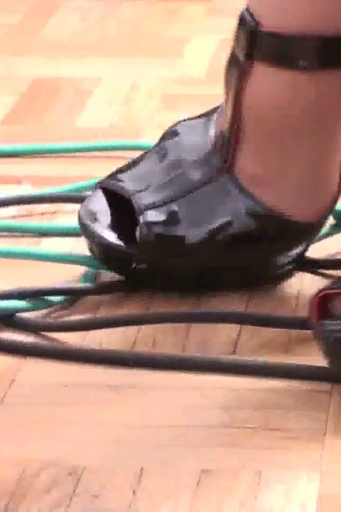 High heeled lady crushing cables