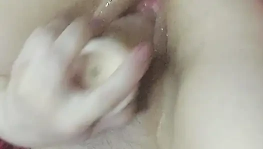 Playing with an Oiled Pussy Close-up