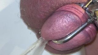 Pissing in chastity, urethral sound