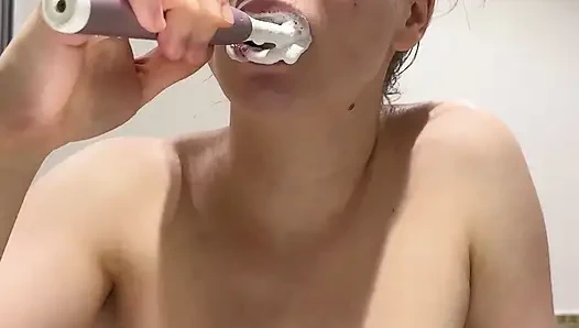 Teen with Braces Brushes Her Teeth