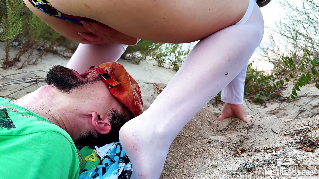 Mistress Pisses Straight Into Slave's Mouth on Wild Beach