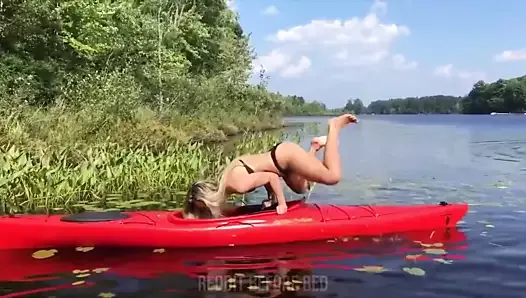 Hot girl in skimpy bikini doing a kayak trick (fail)