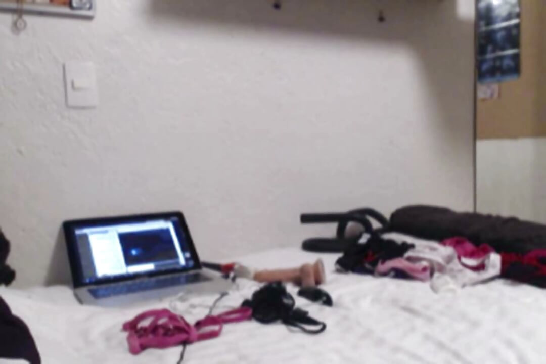 Sexy sissy shoves a dildo in her delicious ass