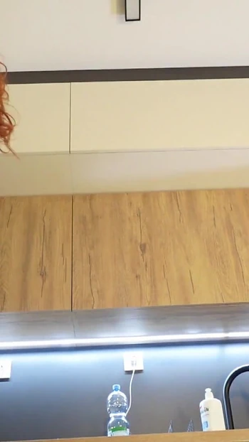 Emotional moment from "Redhead hot wife has a new white mini skirt and pink panties to show off before taking them off"
