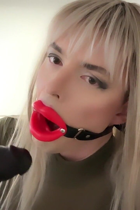 Gagged, Dressed and Sucking Hard