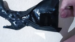 Knee high leather boots fuck and sprinkled with cum