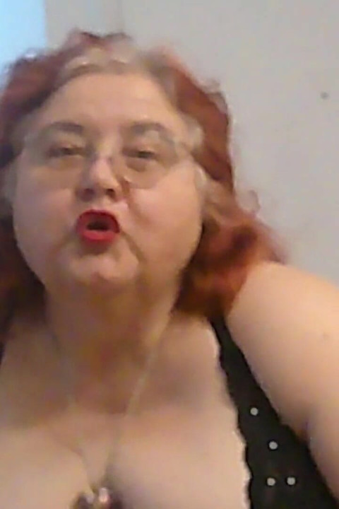 Mature BBW Redhead Nurse Vicki Talks to You as She Makes a Lipstick Applying Video for You!