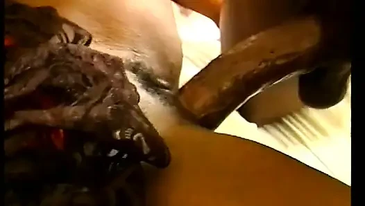 Pretty blonde chick licks and sucks chocolate cock with pleasure