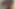 Red-haired Asian in a transparent body undressed and began to masturbate