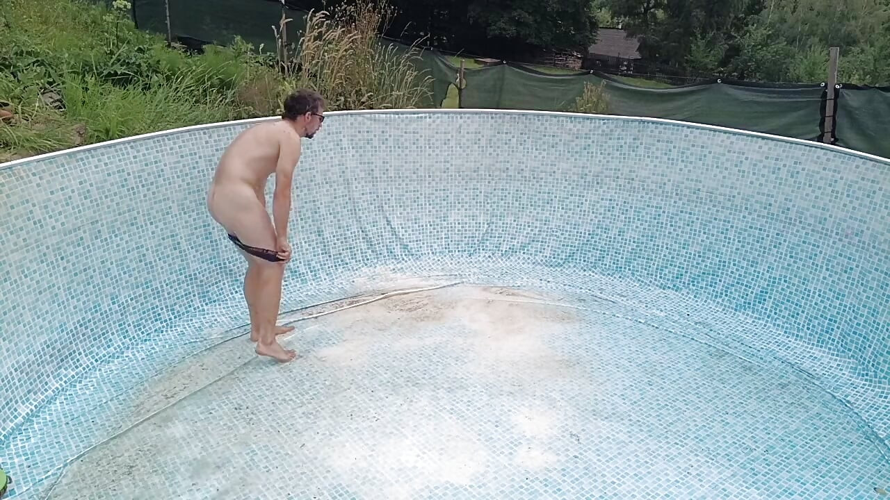 Naked in the Garden: Dirty Handjob in the Pool