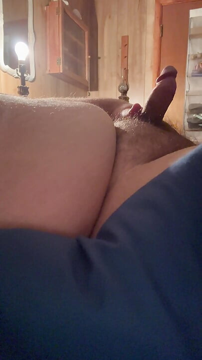 Jerking off in bed. Slow motion cum shot at the end.