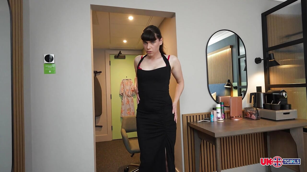 UK TGIRLS Brunette Trans Woman Stroking Her Cock While Sitting With Legs Spread