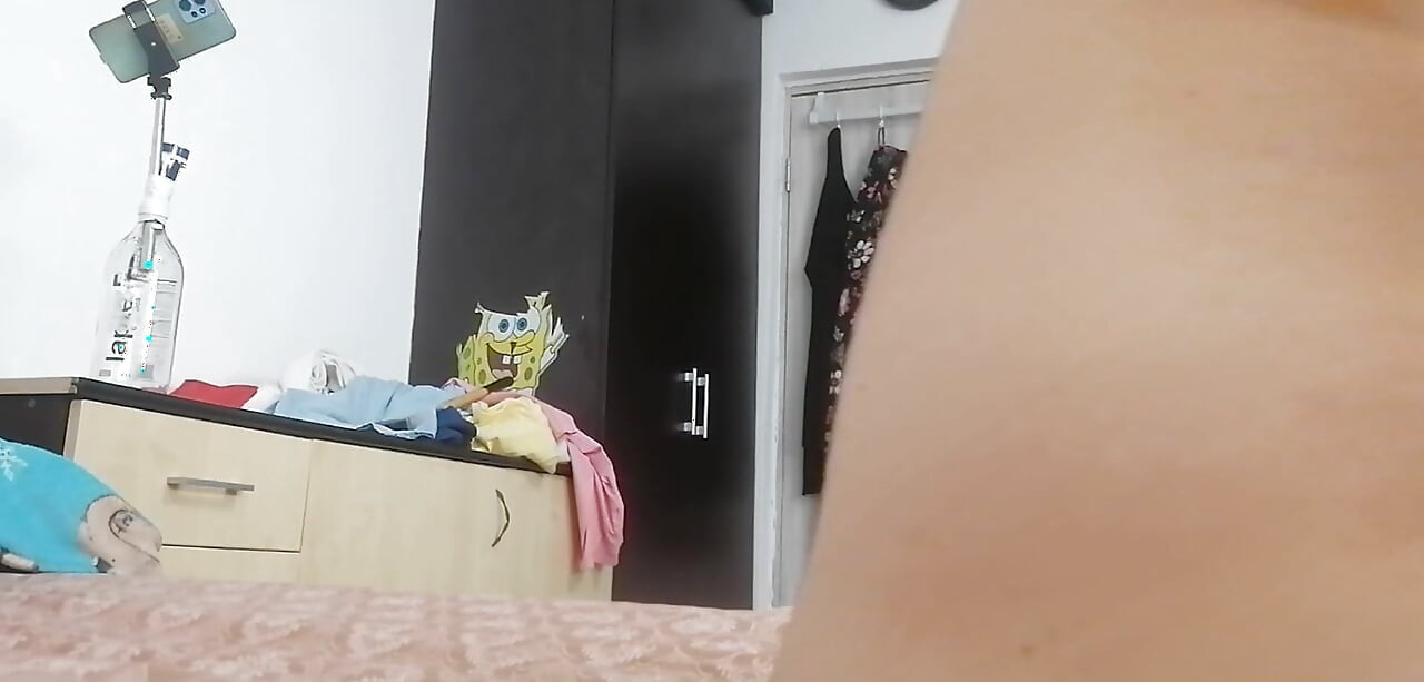 Amateur step-mom masturbates with her fingers in her pussy until orgasm. Amateur step-mom trying on clothes and cutting them.