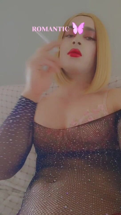 Putting on a garter and waiting for my husband, I lit a cigarette