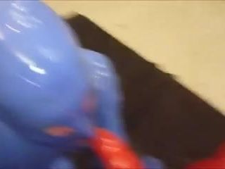 rubber guy sucking his friend
