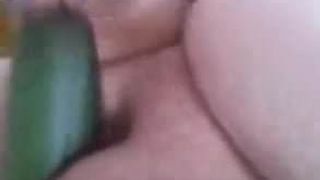 Wifey uses cucumber in her shaved pussy