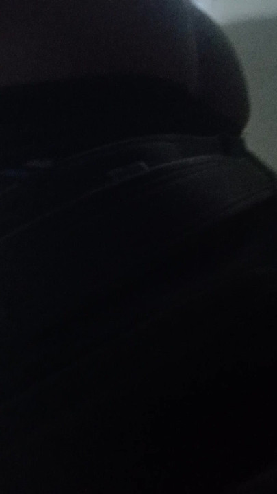 Showing her buttocks in a public bathroom