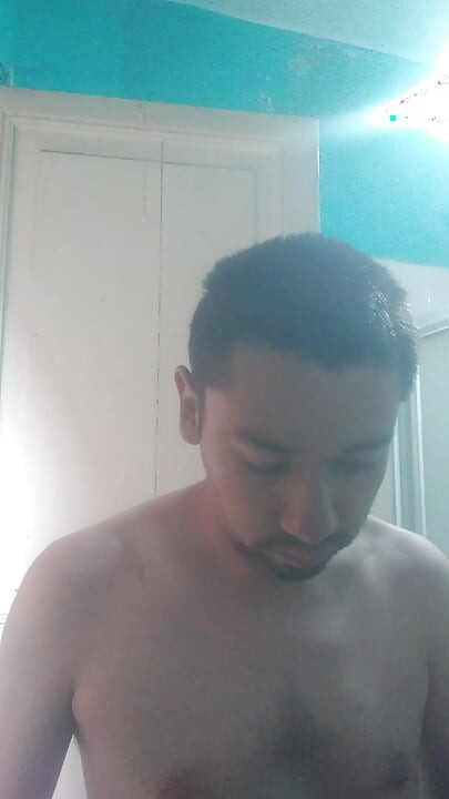 Man washes his face
