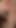 Key moment from "Horny old lady masturbates and fucks a tattooed stud on the floor"