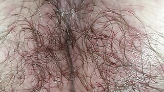 Hairy pussy from behind fingering