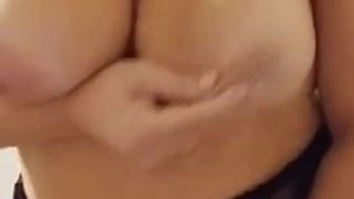 Big tits fingers herself