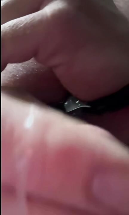 Close up of Brandon Hegsted cumming wearing thigh highs, panties and handcuffs