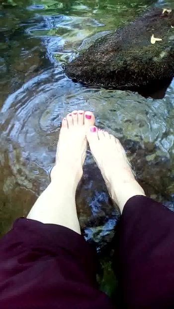 transvestite, feet in water