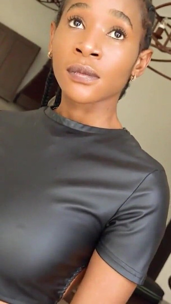 Emotional moment from "Shy Busty African Hottie Gets A Taste Of The Real American Dream"